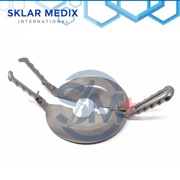 Percy amputation retractor shield with circular fenestrated plate and detachable handles for surgical amputation procedures.